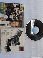 Front cover, lyric insert, and record