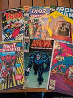 All six comics laid out showing covers