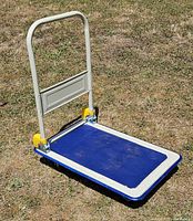 Dolly standing with handle upright showing deck and frame