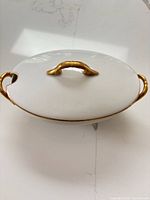 Top view of covered tureen showing lid handle and gold trim