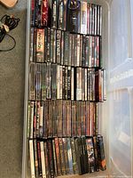 Full bin showing large quantity of DVD spines