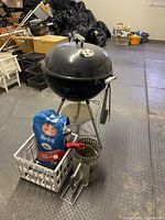 Full view of Weber grill with accessories grouped in front