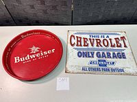 Tray and sign side by side