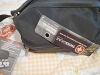 SwissGear toiletry bag exterior with brand tag attached