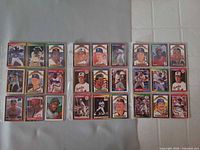 Front view of first sleeve sheet showing 24 cards including managers and players