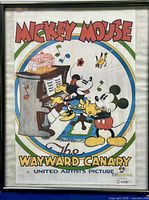 Front view of framed Disney Wayward Canary print showing full artwork and frame