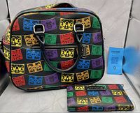 Handbag front view with wallet and size reference