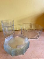 Group shot showing stacked dessert plates, stacked small bowls, and single large bowl
