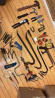 Full layout of all assorted hand tools on floor