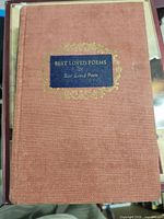 Front cover showing cloth texture, blue label and gilt border