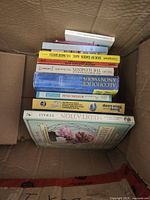 Top view of box showing full stack of paperback books