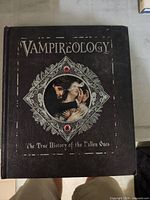 Front cover showing title, artwork and faux jewels