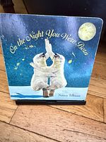 Front cover of board book showing title and polar bear illustration