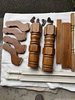 Overview of lighter stained posts, brackets, rails and white posts