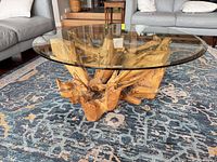 Overall view of teak root base and glass top