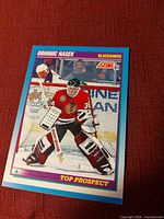 Front of Dominik Hasek Score 91 Top Prospect card