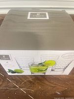 Retail box front showing Gibson Home Great Foundations 4-piece 13 oz glass tumbler set