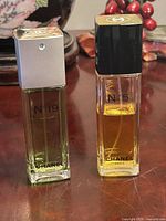 Front view of both Chanel bottles showing labels and liquid levels