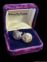 earrings in open Hudson's Bay Company velvet box