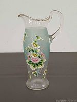 Frontal view showing floral enamel design and overall form