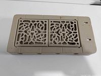 top view of throne base showing dual lattice grates