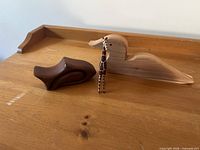 Front view showing all three wooden decor items