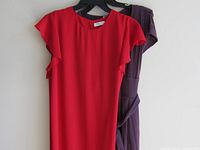 Front view red Babaton dress over purple Wilfred dress