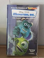 Front cover showing Monsters, Inc. artwork