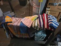 Overview of draped towels showing variety of designs