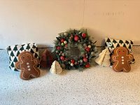 Full lot: wreath, two knit pillows, two gingerbread pillows, three paper trees