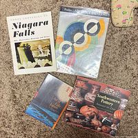 All four books laid out