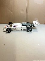 Full side view of Olsonite Eagle #48 racing car decanter