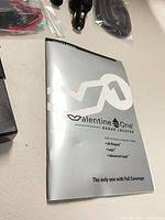 Owners manual booklet on table