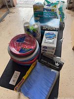 All items grouped on folding table