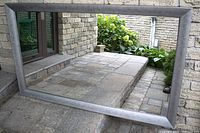 Front view of large rectangular mirror in landscape orientation