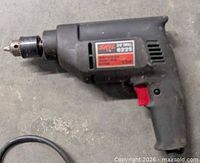 Side view of Skil 6225 drill showing body, trigger and chuck