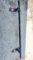Full view of Element grind rail with feet attached
