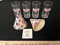 Full lot view showing four glasses and two cone cups
