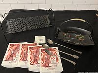 full lot view showing book rack, tray, wrappers, spoons