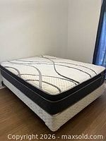 Queen mattress on foundation showing overall appearance