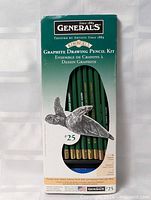 Front view of sealed General's Kimberly Graphite Drawing Pencil Kit showing pencils, turtle artwork and accessories