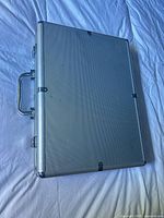 Closed aluminum poker chip case