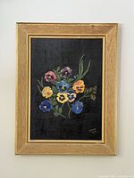 Front view of framed pansy oil painting