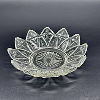 Oblique view of bowl showing starburst pattern and scalloped rim
