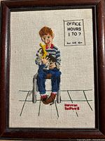 Full view of framed crewel embroidery artwork