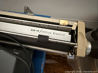 Close-up of carriage showing 250-15 / Office Electric printing