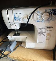 Front view of Brother LS2250PRW sewing machine with pedal visible
