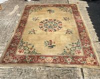 Full view of wool rug showing entire pattern and overall condition
