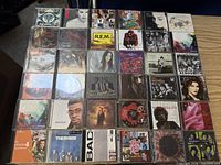 Overview grid of 30 representative CDs showing genres and artists