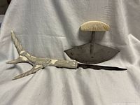 Ulu rocker knife and antler knife side by side